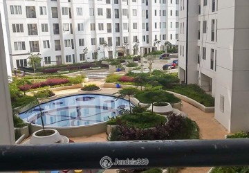 Balcony Modern 1BR Apartment Middle Floor with swimming pool View at Bassura City Apartment