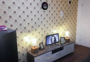 Living Room Modern 1BR Apartment Middle Floor with swimming pool View at Bassura City Apartment