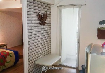 Living Room Modern 1BR Apartment Middle Floor with swimming pool View at Bassura City Apartment