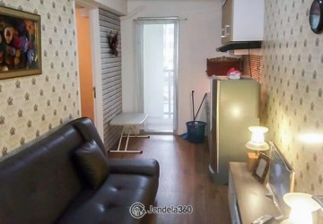 Living Room Modern 1BR Apartment Middle Floor with swimming pool View at Bassura City Apartment