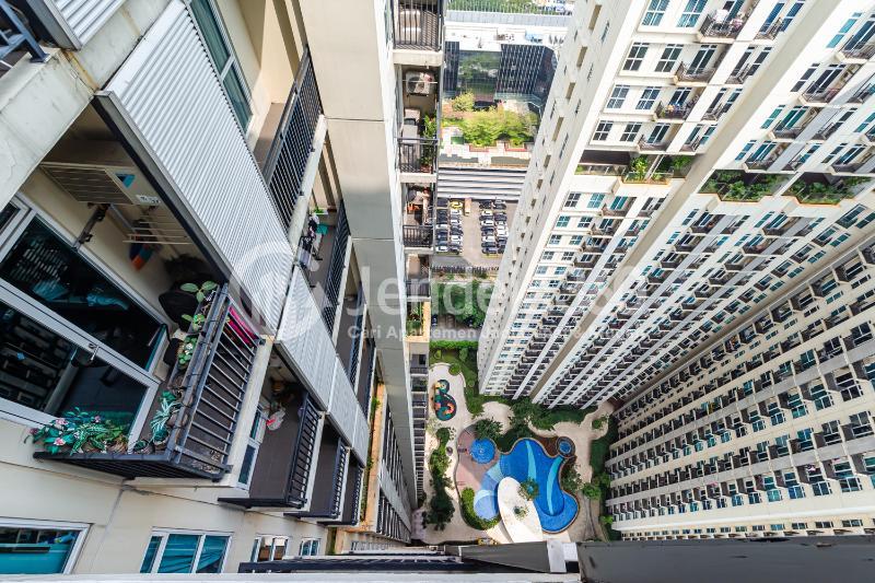 Balcony Comfortable Studio Apartment at Puri Orchard Apartment Tower Cedar Heights A