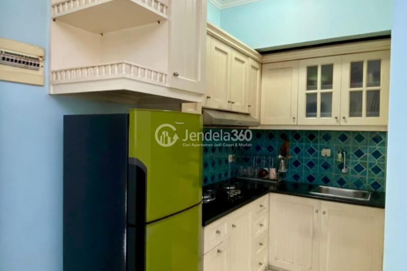 Kitchen Affordable 3BR Apartment Middle Floor with Pool View at Gading Mediterania Residence