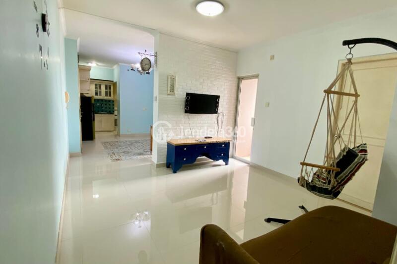 Living Room Affordable 3BR Apartment Middle Floor with Pool View at Gading Mediterania Residence