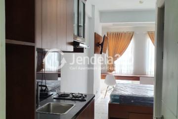 Kitchen Studio Patraland Urbano Apartment at Middle Floor