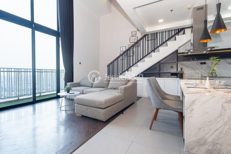Living Room Studio Apartment with city View at Neo Soho Residence