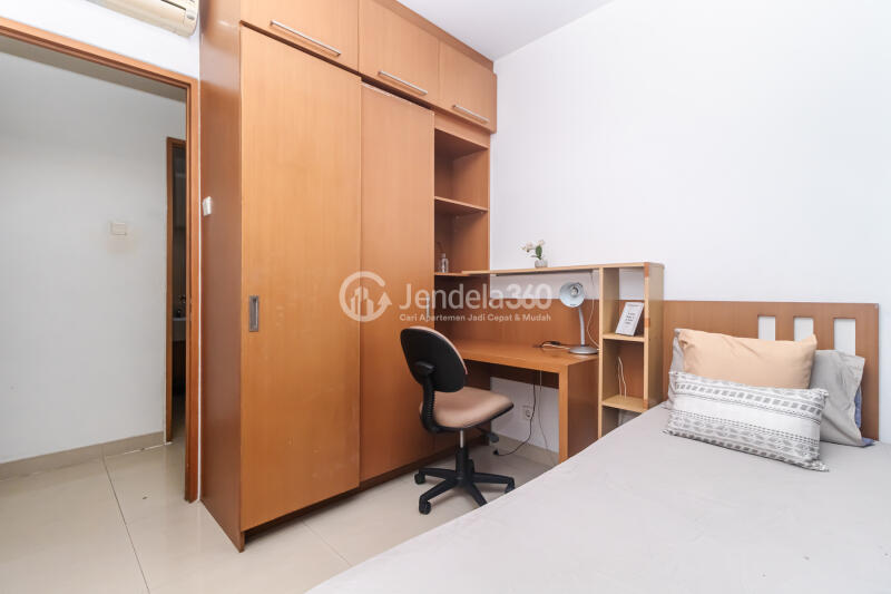 Bedroom 2 3BR Apartment with Golf Area View at Hamptons Park Apartment