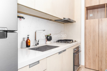 Kitchen Flawless 2BR Apartment Middle Floor with Toll Road View at Izzara Apartment