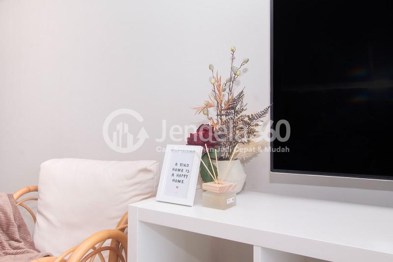 Living Room Well Furnished 2BR Apartment Close to MNC Studio Kebon Jeruk at Maqna Residence