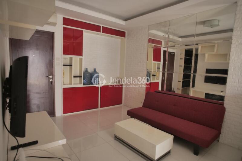 Living Room Homey 3BR Apartment High Floor with City View at Mediterania Garden Residence 2