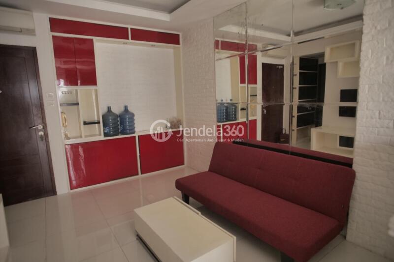 Living Room Homey 3BR Apartment High Floor with City View at Mediterania Garden Residence 2