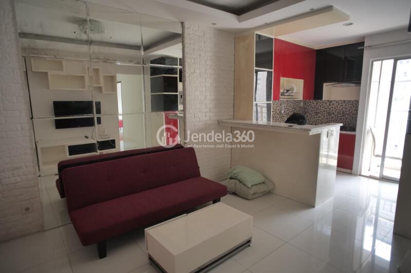 Living Room Homey 3BR Apartment High Floor with City View at Mediterania Garden Residence 2