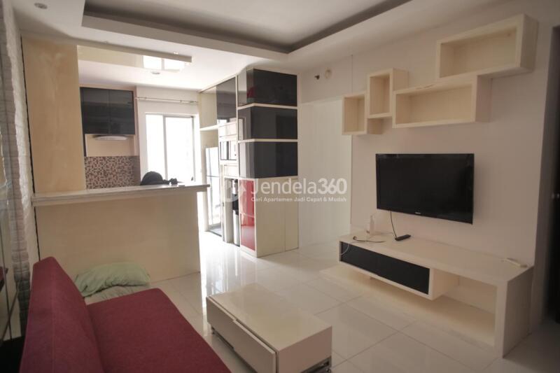 Living Room Homey 3BR Apartment High Floor with City View at Mediterania Garden Residence 2