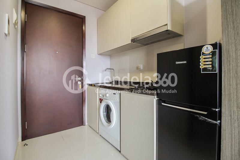 Kitchen A Riverside Studio Apartment with City View at Puri Mansion