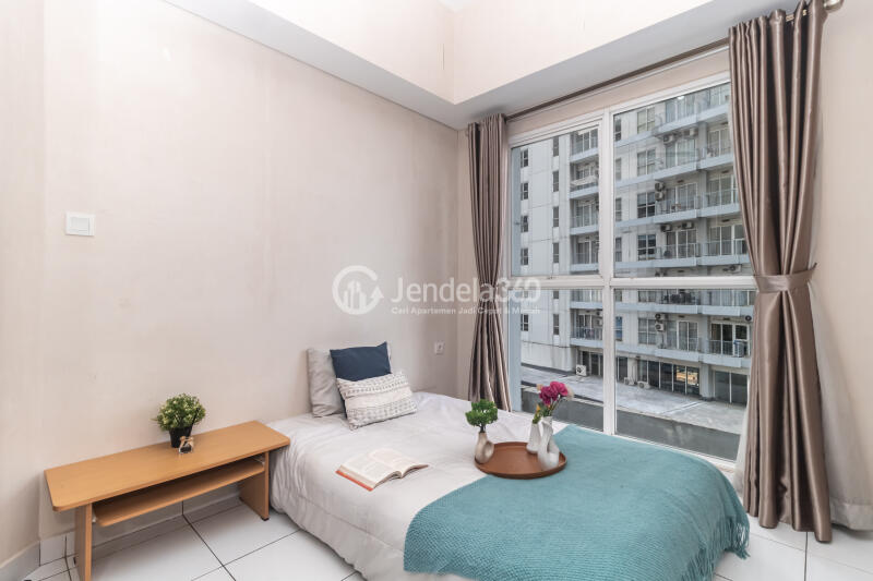Bedroom 1 Peaceful 2BR Apartment Low Floor with city View at Casa De Parco Apartment