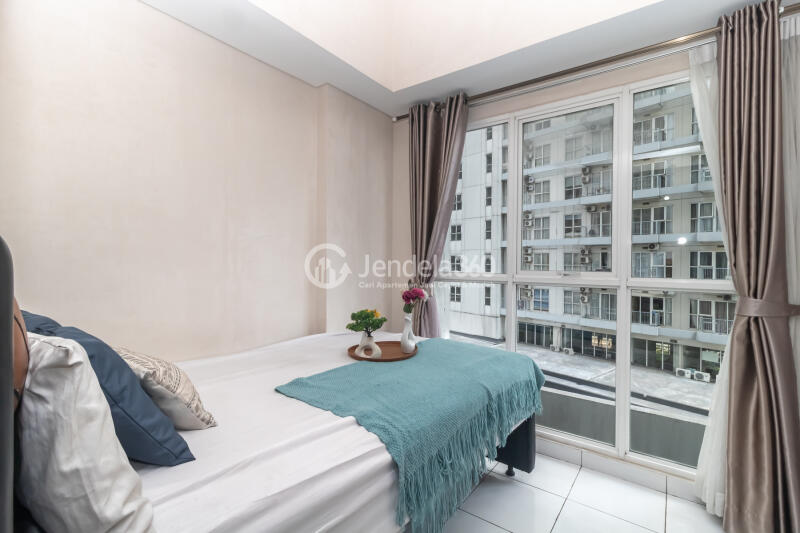 Bedroom 2 Peaceful 2BR Apartment Low Floor with city View at Casa De Parco Apartment