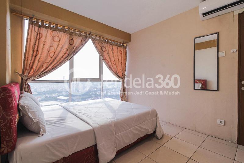 Bedroom 1 Cozy 2BR Apartment at Tifolia Apartment
