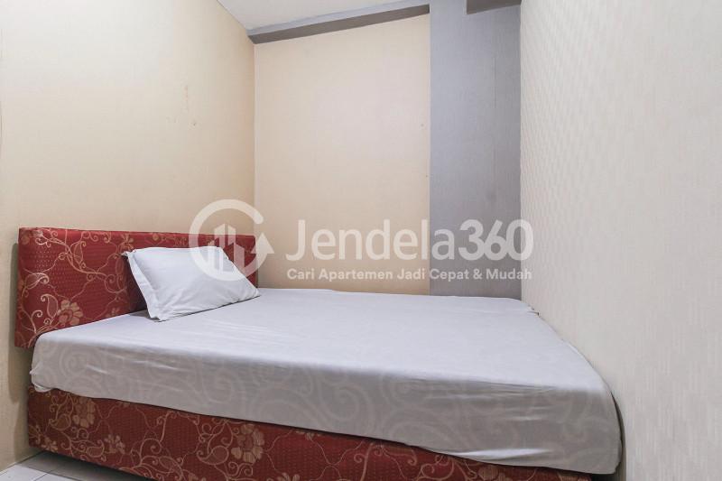 Bedroom 2 Cozy 2BR Apartment at Tifolia Apartment