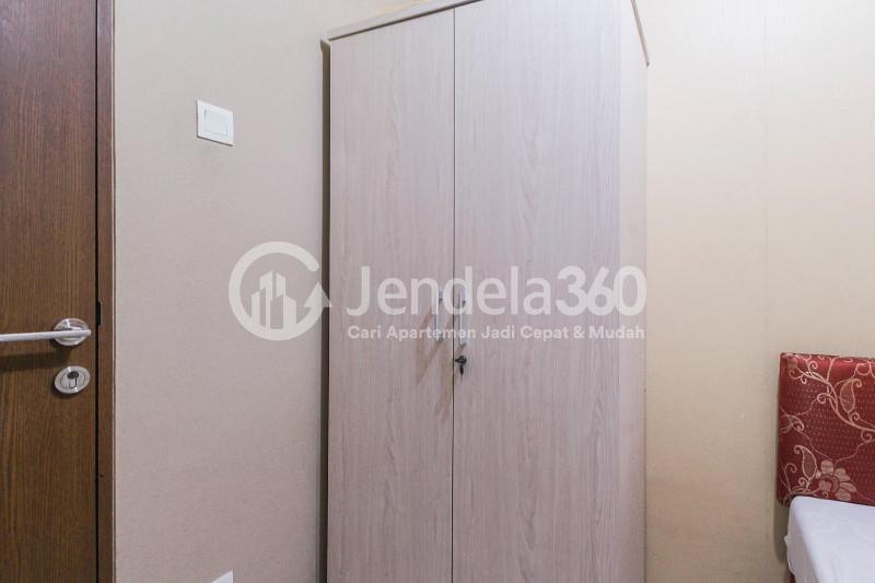 Bedroom 2 Cozy 2BR Apartment at Tifolia Apartment