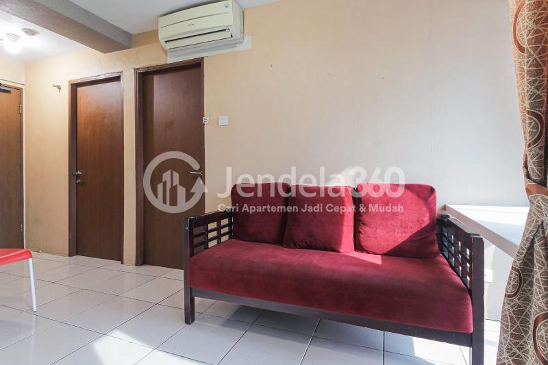 Living Room Cozy 2BR Apartment at Tifolia Apartment