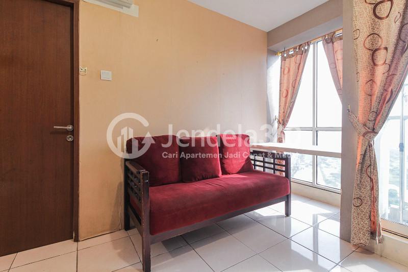 Living Room Cozy 2BR Apartment at Tifolia Apartment