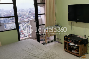 Living Room High Floor 2BR Apartment with City View at Salemba Residence