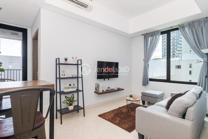 Living Room 1BR Apartment with City View at Southgate Residence