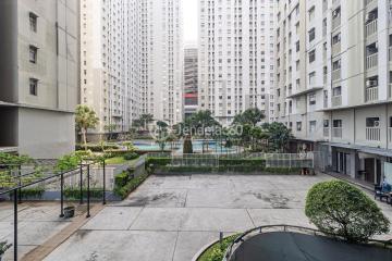 Balcony 2BR Apartment with City View at Green Bay Pluit Apartment