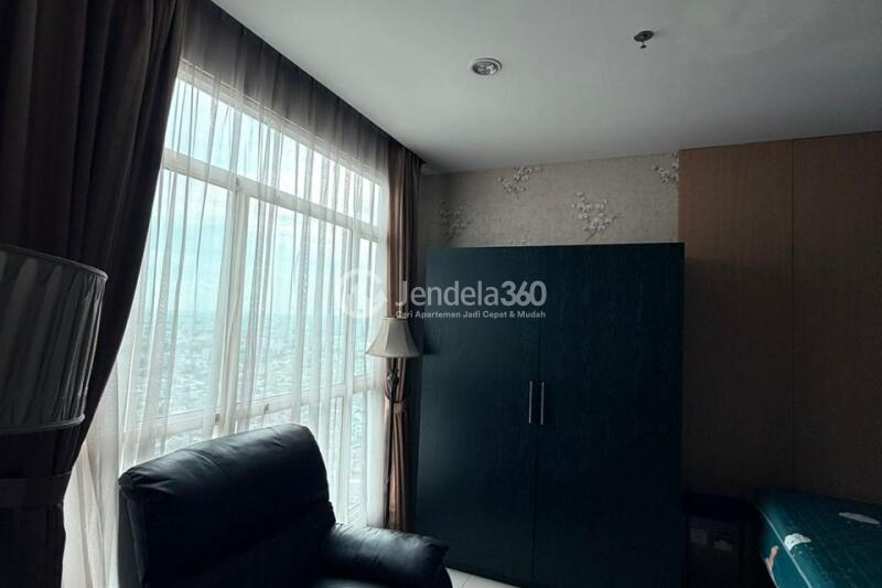 Living Room Homey 1BR Apartment High Floor with City View at Central Park Apartment