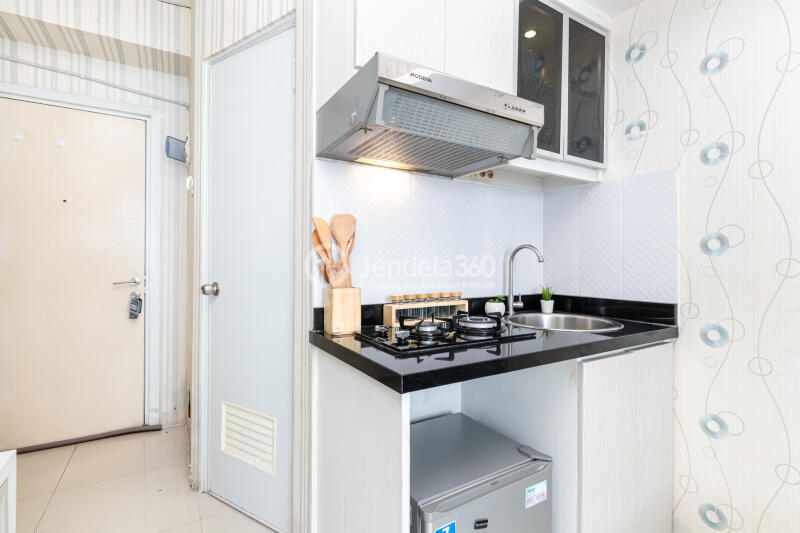 Kitchen 2BR Green Pramuka City Apartment at High Floor