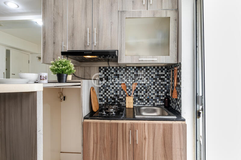 Kitchen Cozy 2BR Apartment at Bassura City Apartment Close to McDonald's Duren Sawit