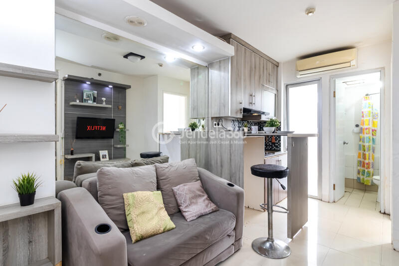 Living Room Cozy 2BR Apartment at Bassura City Apartment Close to McDonald's Duren Sawit