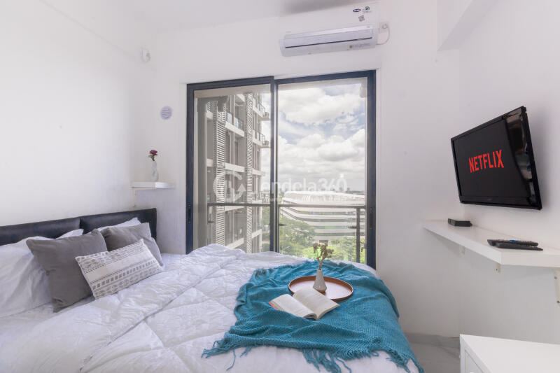 Bedroom Elegant Studio Apartment with City View at Sky House BSD Apartment