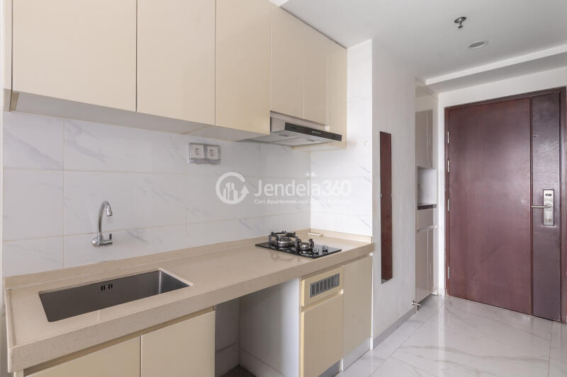 Kitchen Elegant Studio Apartment with City View at Sky House BSD Apartment