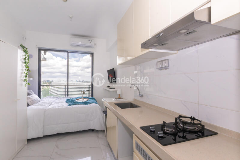 Kitchen Elegant Studio Apartment with City View at Sky House BSD Apartment