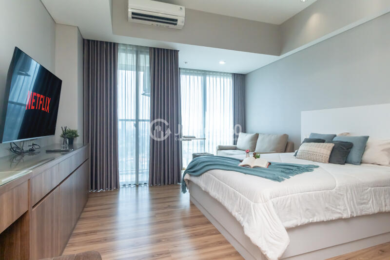 Bedroom Spacious Studio Apartment Near Universitas Pancasila at Southgate Residence