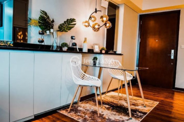 Living Room 2BR Apartment with City View at Casa Grande Apartment