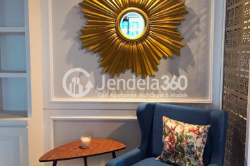 Living Room Middle Floor 3BR Apartment with City View at Casa Grande Apartment