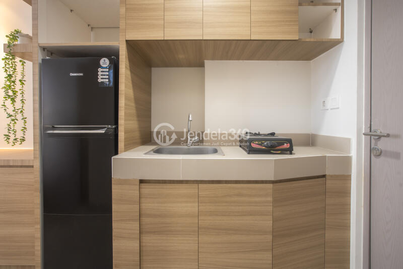 Kitchen An High Floor Studio Apartment with Exotic Pool with City View at Vasanta Innopark Apartment