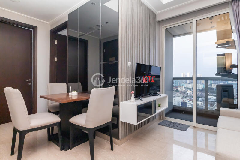 Living Room High Floor 2BR Apartment with City View at Menteng Park