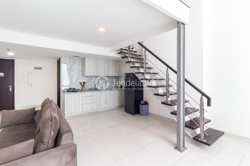 Living Room Comfortable 1BR Apartment Low Floor with City View at Brooklyn Alam Sutera Apartment
