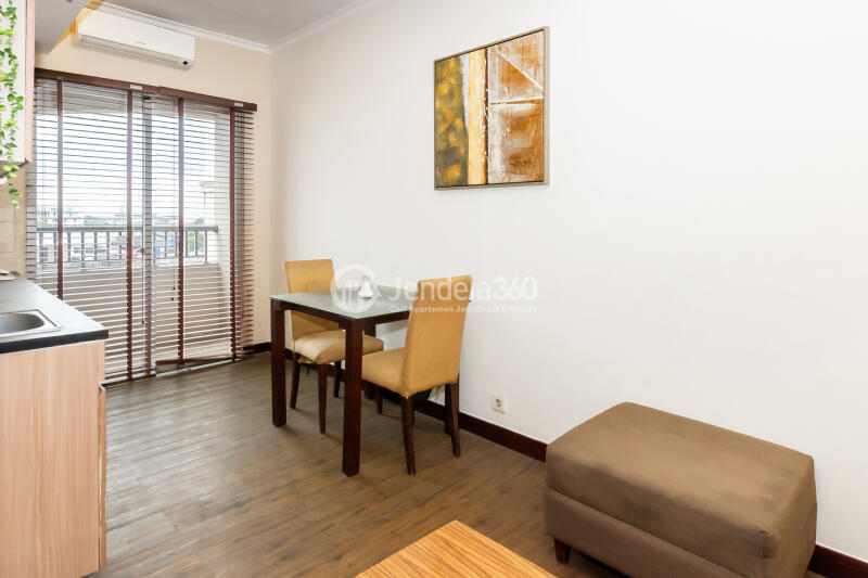 Dining Room Cozy 1BR Apartment Near Kampung Bandan Station with City View at Mediterania Marina Ancol Apartment