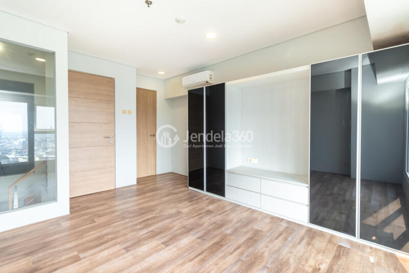 Bedroom 1 Restful 2BR Apartment Middle Floor with City View at Maqna Residence