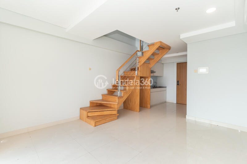 Living Room Restful 2BR Apartment Middle Floor with City View at Maqna Residence
