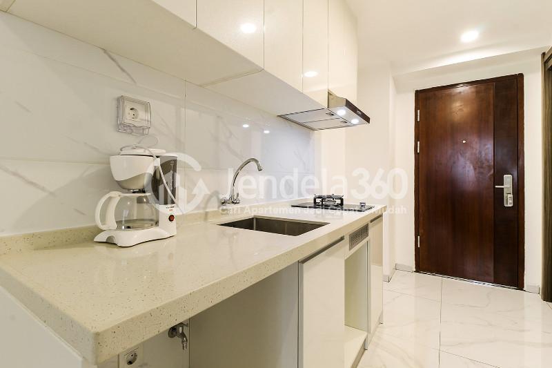Kitchen Lovely Studio Apartment with A Comfortable Garden at Sky House Alam Sutera