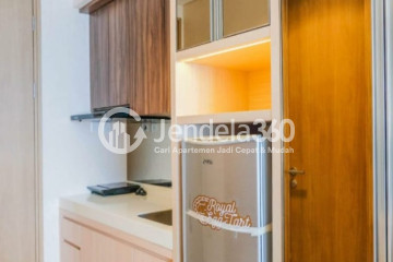 Kitchen Restful Studio Apartment High Floor with City View at Tree Park City