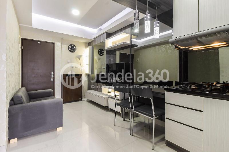 Living Room Peaceful 2BR Apartment with Elegant Modern Interior at Puri Park View Apartment