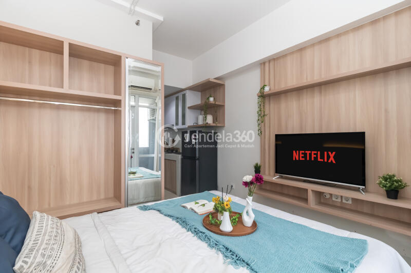 Bedroom Fancy Studio Apartment Middle Floor with City View at Vasanta Innopark Apartment