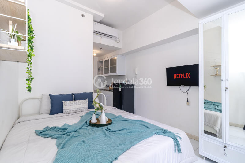 Bedroom A Comfy and Compact Studio Apartment with City View at Tokyo Riverside