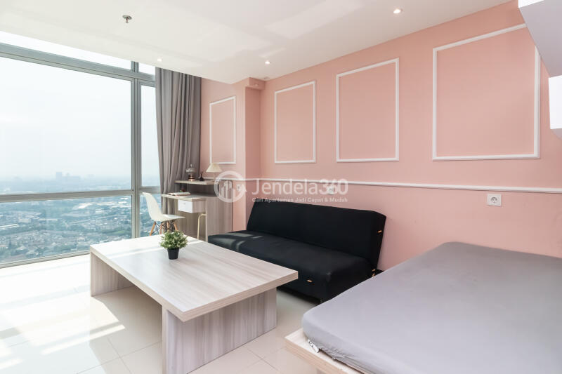 Living Room Homey 1BR Apartment High Floor with City View at U Residence Karawaci