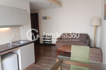 Living Room High Floor 1BR Apartment with City View at Mediterania Marina Ancol Apartment